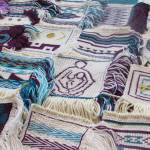 The exact pattern of the Giving Strength Robe is not yet decided, but 54 squares made by Ravenstail and Chilkat weavers are in Juneau and ready to be used in the robe meant to honor survivors of violence. (Ben Hohenstatt | Juneau Empire)