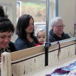 Ursala Hudson, Lily Hope, Anastasia Hope and Patty Fiorella work together on the Giving Strength Robe Friday, April 12, 2019. Ben Hohenstatt | Juneau Empire)
