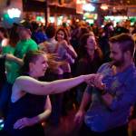 Kelsey Schober and Shea Siagert dance to Big Chimney Barn Dance at The Rendezvous during Alaska Folk Festival week on Friday, April 12, 2019. (Michael Penn | Juneau Empire)