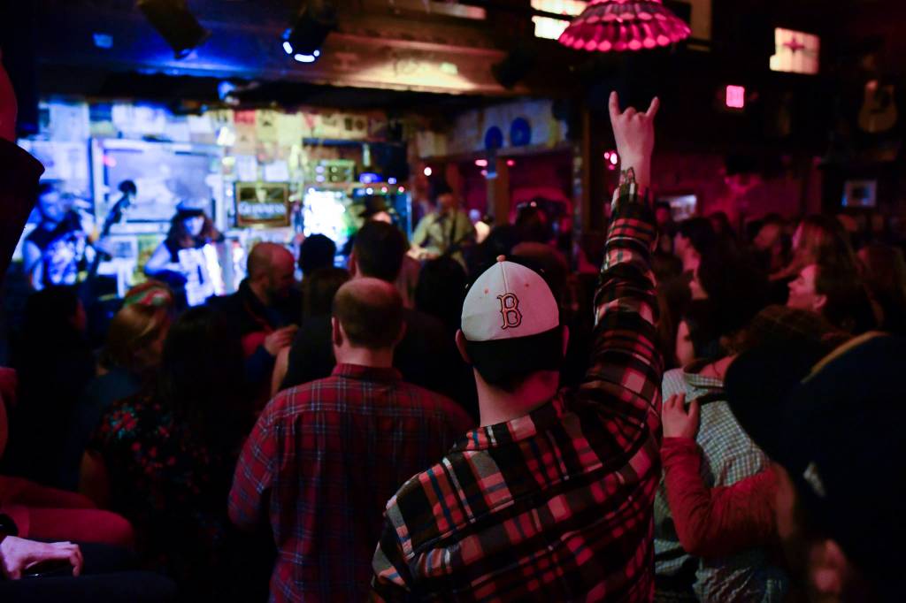 Bar patrons and music lovers catch The Shoot Dangs at the Alaskan Hotel & Bar during Alaska Folk Festival week on Friday, April 12, 2019. (Michael Penn | Juneau Empire)