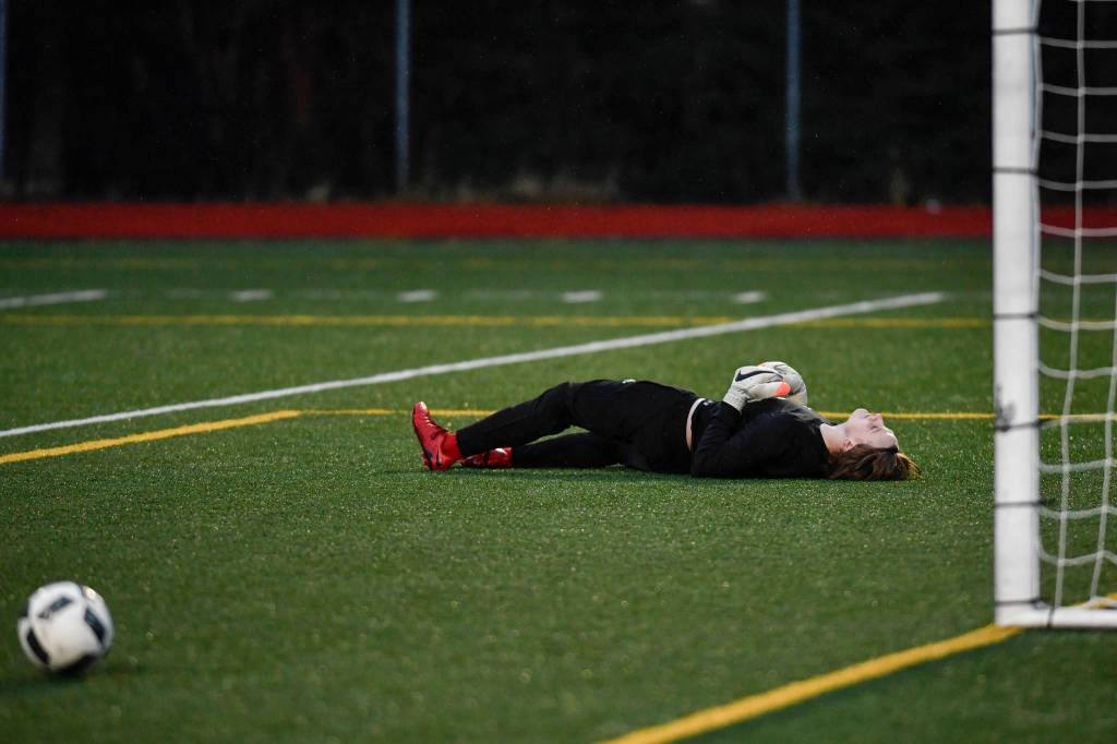 <strong>Michael Penn | Juneau Empire</strong>                                Juneau-Douglas goalkeeper Tad Watson reacts to Thunder Mountains Wallace Adams goal in the first half at Adair-Kennedy Memorial Field on Wednesday. Thunder Mountain won 2-1.