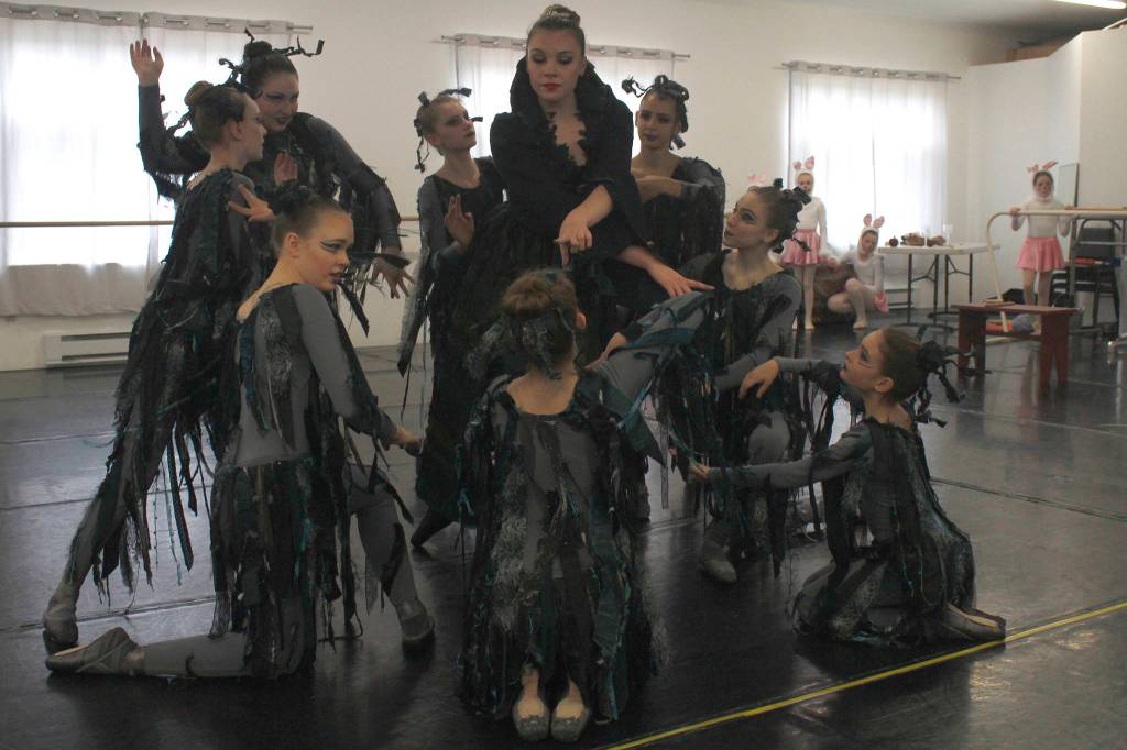 Jillian Anderson, center, portrays the evil queen during a rehearsal for Juneau Dance Theatres production of Snow White at Juneau Dance Theatre on Saturday, April 20, 2019. (Alex McCarthy | Juneau Empire)