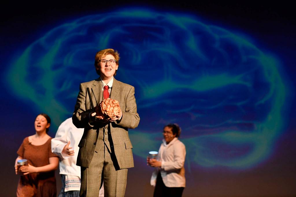 Callum Marks plays Frederick Frankenstein during a rehearsal of the Thunder Mountain High School production of Young Frankenstein at TMHS on Thursday, April 18, 2019. (Michael Penn | Juneau Empire)