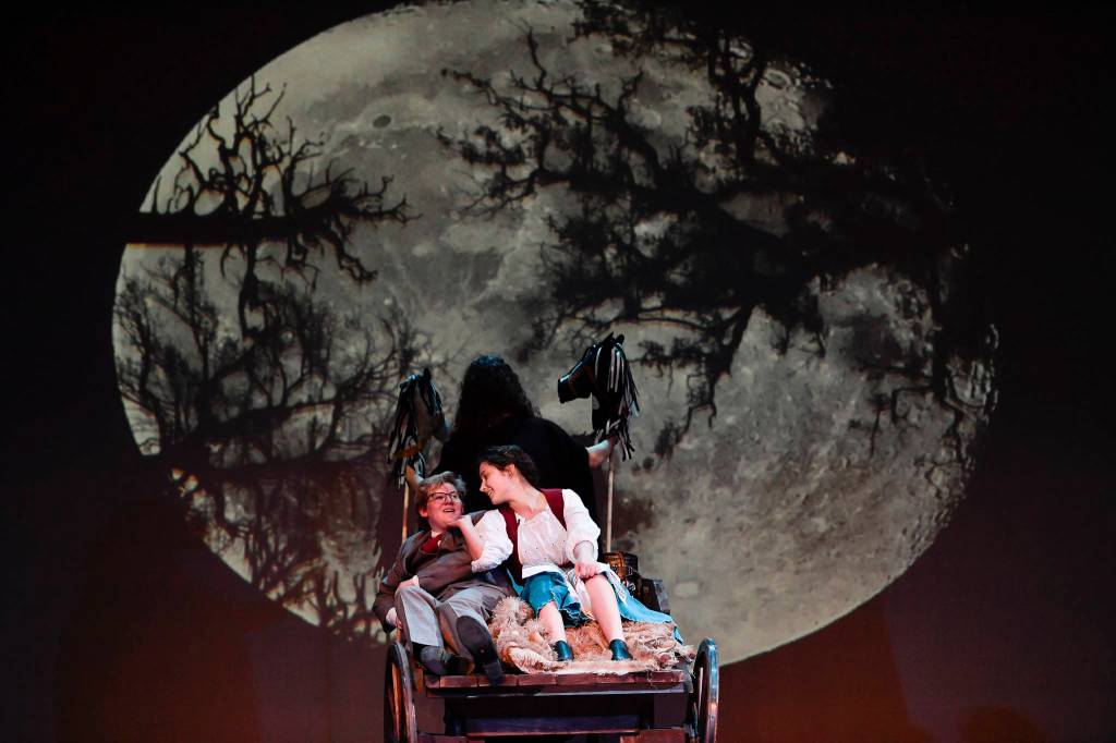 Callum Marks, as Frederick Frankenstein, takes a buggy ride with Morgan Blackgoat, as Inga, during a rehearsal of the Thunder Mountain High School production of Young Frankenstein at TMHS on Thursday, April 18, 2019. (Michael Penn | Juneau Empire)