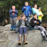 Grandkids harvest popweed. (Courtesy Photo | Vivian Faith Prescott)