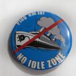 A button handed out by Renewable Juneau supports shore power, which allows cruise ships to avoid idling their engines by providing electricity from the shore. (Ben Hohenstatt | Juneau Empire)