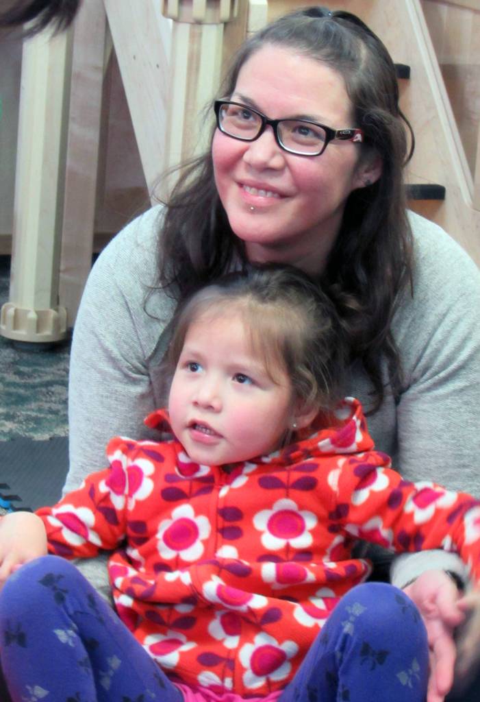 Emily Sheakley and Kax du.óo Mayzie Sheakley, 5, smile during an activity during a family night event in the Haa Yoo Xatángi Kúdi classroom, Monday, April 22, 2019. (Ben Hohenstatt | Juneau Empire)