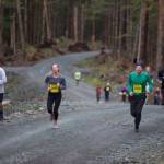 Runners race in the Run 4 the Rock race on Pioneer Road and North Douglas Highway on Saturday. (Courtesy photo | Matthew York)