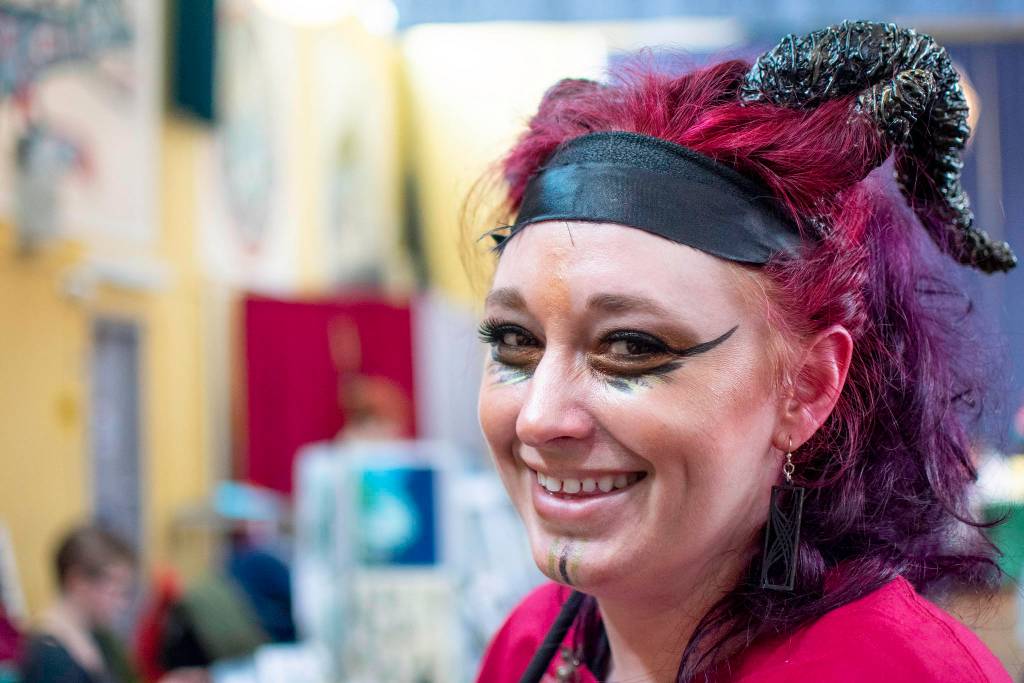 Brittany Dresen volunteers at the Alaska Robotics Mini-Con at the Juneau Arts & Culture Center on Saturday, April 28, 2018. (Lance Nesbitt | Juneau Empire File)