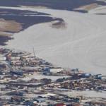 Snowmachine and ice road trails on the Kuskokwim River in Bethel in March. (Courtesy Photo | Ned Rozell)
