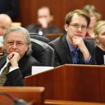 Sen. Tom Begich, D-Anchorage, left, Rep. Lance Pruitt, R-Anchorage, center, Rep. DeLena Johnson, R-Wasilla, and other legislators listen to debate for and against Amanda Price for commissioner of the Department of Public Safety during confirmation voting during a joint session of the Alaska Legislature at the Capitol on Wednesday, April 17, 2019. (Michael Penn | Juneau Empire)