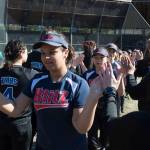 Players run a gauntlet of Thunder Mountain High School baseball and softball team players during the Gastineau Channel Little League Opening Day Ceremonies at Adair-Kennedy Memorial Park on Saturday, April 27, 2019. (Michael Penn | Juneau Empire)