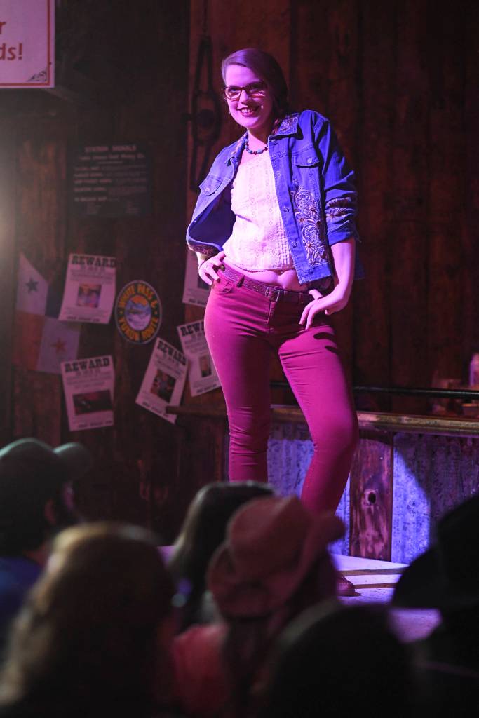 Womens clothing from Alaskan Dames is modeled on stage during the Juneau Rotaracts Wild West Roundup Fashion Show at the Red Dog Saloon on Saturday, April 27, 2019. (Michael Penn | Juneau Empire)