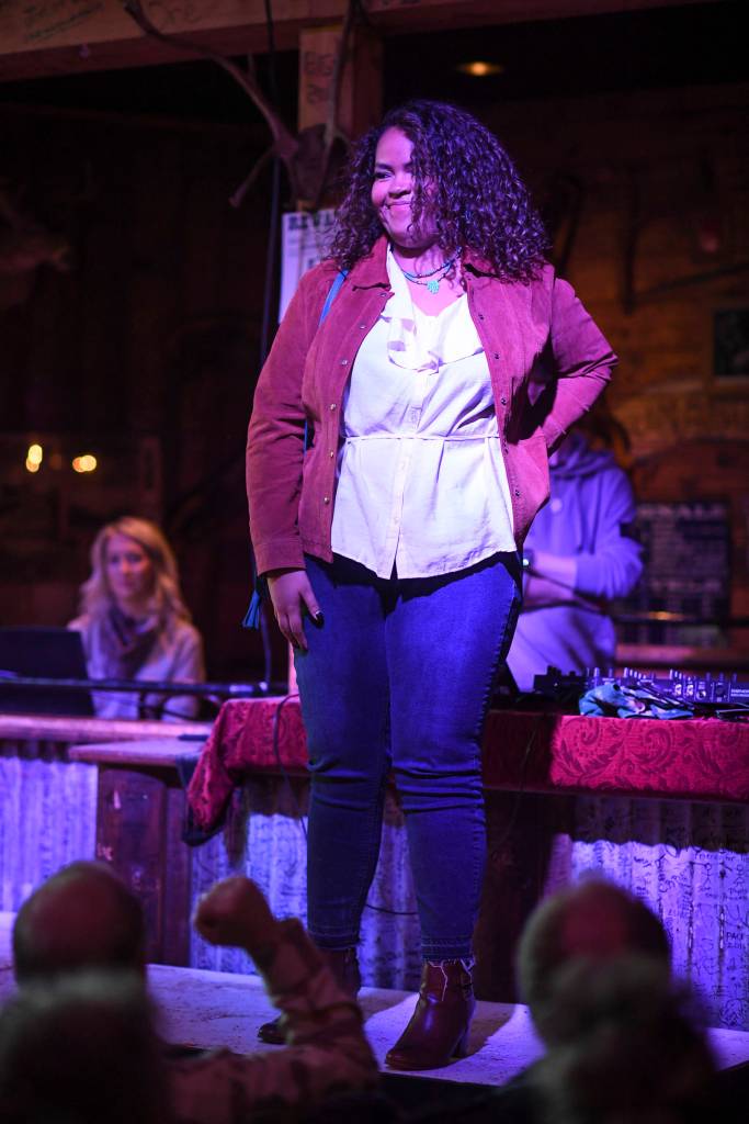Womens clothing from Alaskan Dames is modeled on stage during the Juneau Rotaracts Wild West Roundup Fashion Show at the Red Dog Saloon on Saturday, April 27, 2019. (Michael Penn | Juneau Empire)
