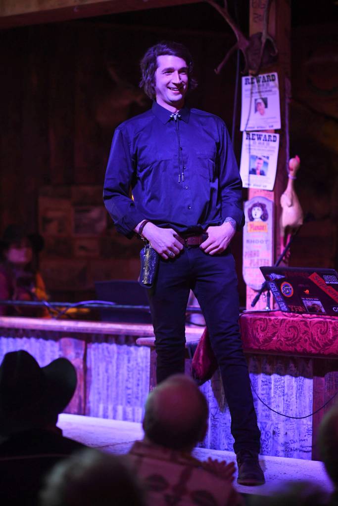 Mens clothing from 4th Coast Outfitters is modeled on stage during the Juneau Rotaracts Wild West Roundup Fashion Show at the Red Dog Saloon on Saturday, April 27, 2019. (Michael Penn | Juneau Empire)