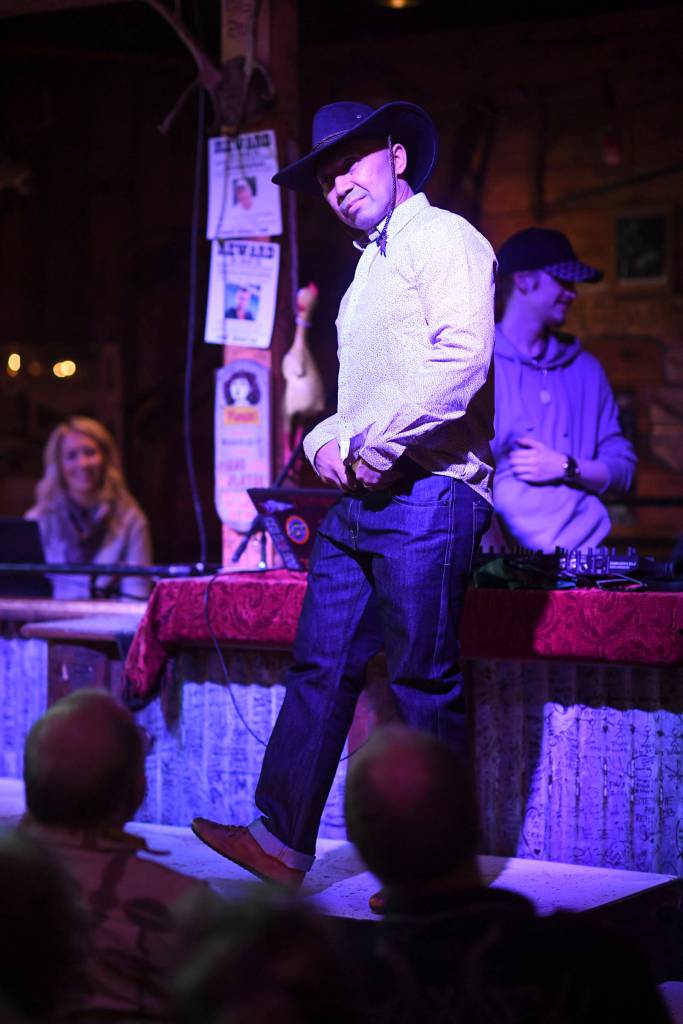 Mens clothing from 4th Coast Outfitters is modeled on stage during the Juneau Rotaracts Wild West Roundup Fashion Show at the Red Dog Saloon on Saturday, April 27, 2019. (Michael Penn | Juneau Empire)