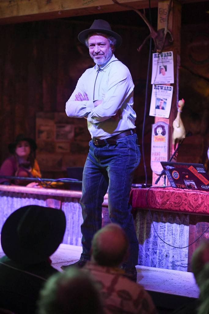 Mens clothing from 4th Coast Outfitters is modeled on stage during the Juneau Rotaracts Wild West Roundup Fashion Show at the Red Dog Saloon on Saturday, April 27, 2019. (Michael Penn | Juneau Empire)
