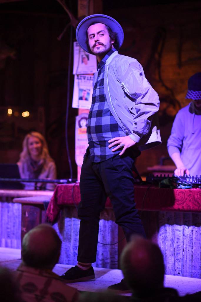 Mens clothing from 4th Coast Outfitters is modeled on stage during the Juneau Rotaracts Wild West Roundup Fashion Show at the Red Dog Saloon on Saturday, April 27, 2019. (Michael Penn | Juneau Empire)