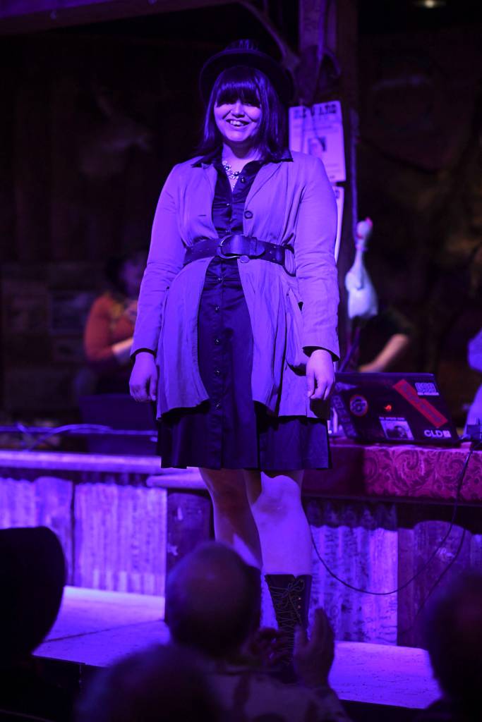 Mens and womens clothing from Downtown Dames Resale Shop is modeled on stage during the Juneau Rotaracts Wild West Roundup Fashion Show at the Red Dog Saloon on Saturday, April 27, 2019. (Michael Penn | Juneau Empire)
