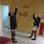 Eldred Rock Lighthouse Preservation Association Executive Director Sue York and board member Justin Fantasia examine Eldred Rock Lighthouse on Monday, April 29, 2019. (Alex McCarthy | Juneau Empire)