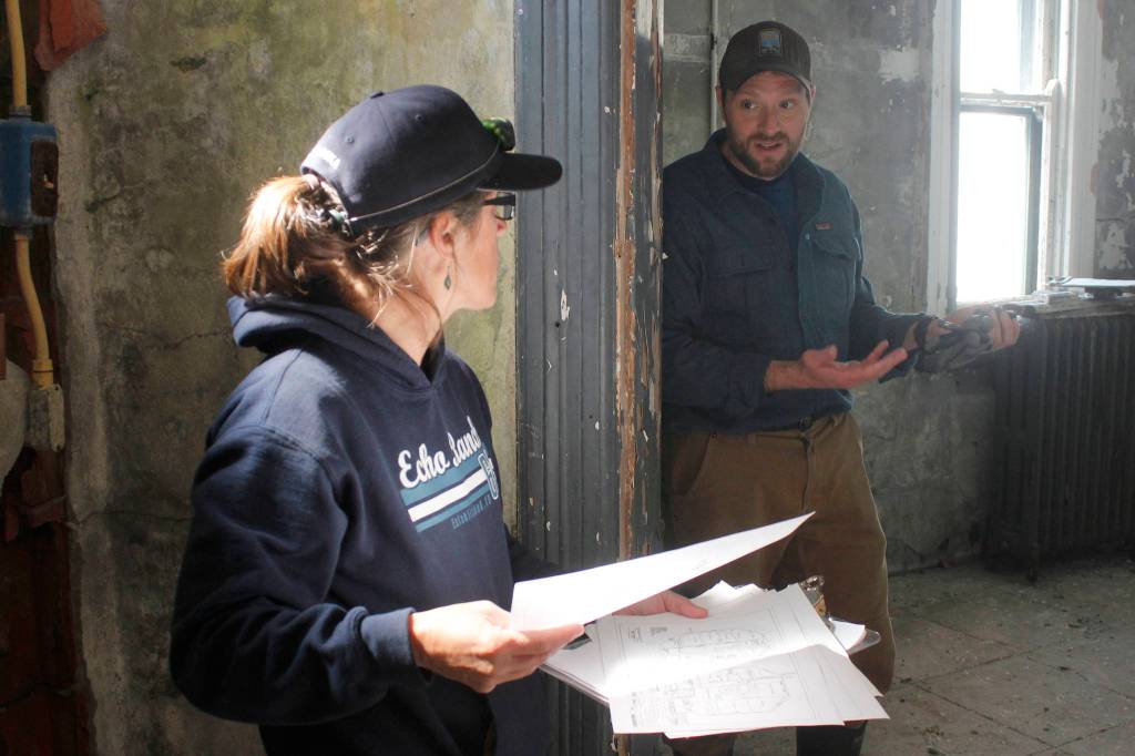 Eldred Rock Lighthouse Preservation Association Executive Director Sue York and Marine Exchange of Alaskas board representative Jonathan Wood share ideas at the Eldred Rock Lighthouse on Monday, April 29, 2019. (Alex McCarthy | Juneau Empire)