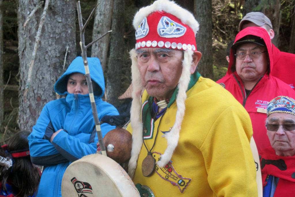 George Digger Dalton Jr. stands in regalia during a ground breaking and ground blessing ceremony for at the site of a new dock being built at Icy Strait Point near Hoonah, May 1, 2019. (Ben Hohenstatt | Juneau Empire)