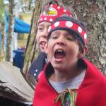 Jorge Sandoval, 9, belts out a song during a ground breaking and blessing ceremony at the site of the new dock at Icy Strait Point, May 1, 2019. Huna Totem owns the tourist destination near the village of Hoonah. (Ben Hohenstatt | Juneau Empire)