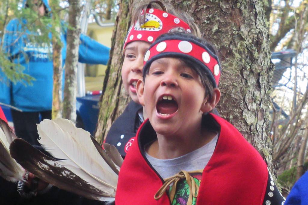 Jorge Sandoval, 9, belts out a song during a ground breaking and blessing ceremony at the site of the new dock at Icy Strait Point, May 1, 2019. Huna Totem owns the tourist destination near the village of Hoonah. (Ben Hohenstatt | Juneau Empire)