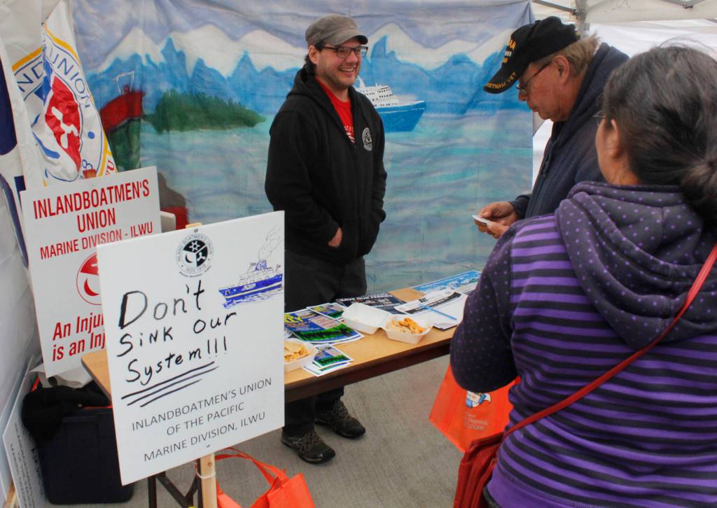 Anthony Distefano, a union steward for the Inlandboatmens Union, talks to attendees at the Maritime Festival on Saturday, May 4, 2019. (Alex McCarthy | Juneau Empire)