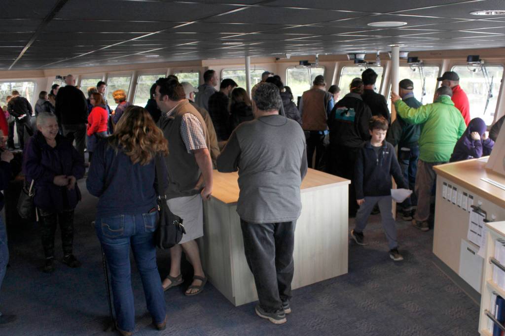 Members of the public explore the bridge of the ferry Tazlina on Sunday, May 5, 2019. (Alex McCarthy | Juneau Empire)
