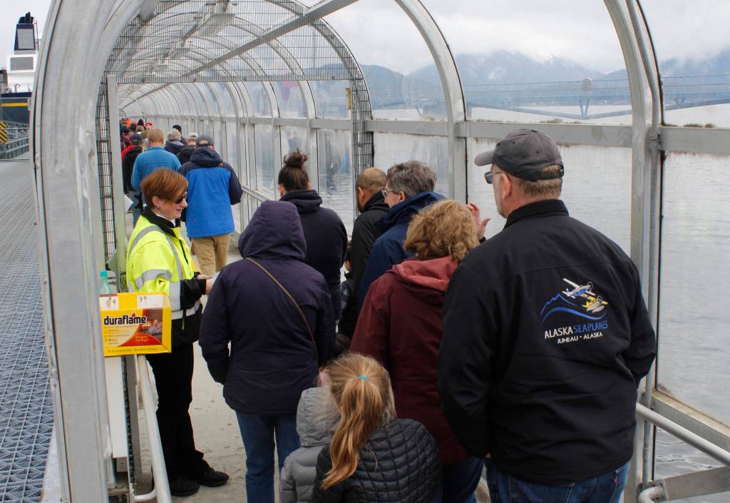 Members of the public walk onto the ferry Tazlina on Sunday, May 5, 2019. (Alex McCarthy | Juneau Empire)