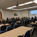 About two dozen people attended a May 7 public meeting about a Centennial Hall design options study. (Ben Hohenstatt | Juneau Empire)