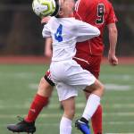 Juneau-Douglas Richard Lehner, right, and Thunder Mountains Phillip Lam battle for the ball at Adair-Kennedy Memorial Field on Tuesday, May 7, 2019. The game ended tied at 1-1. (Michael Penn | Juneau Empire)