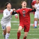 Juneau-Douglas Koby Goldstein, right, heads the ball against Thunder Mountains Gavin Gende at Adair-Kennedy Memorial Field on Tuesday, May 7, 2019. The game ended tied at 1-1. (Michael Penn | Juneau Empire)