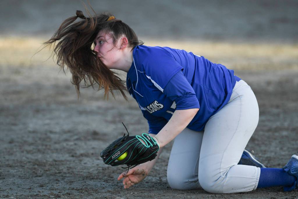 Thunder Mountains Rileyanna Payne stops a ground ball against Sitka at Dimond Park on Thursday, May 9, 2019. Sitka won 2-1. (Michael Penn | Juneau Empire)
