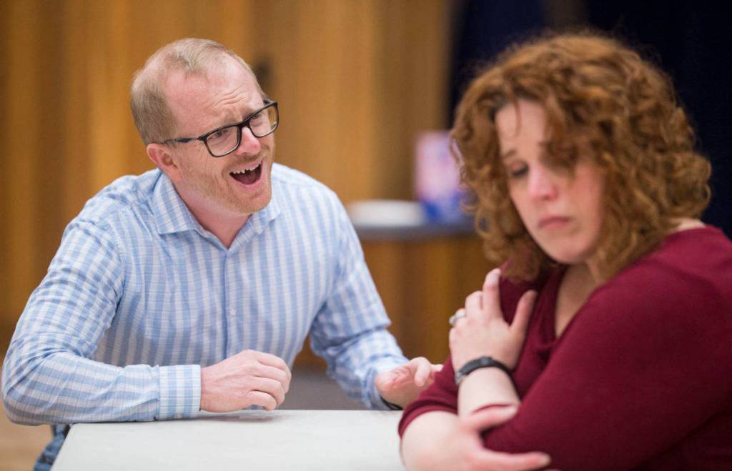 Dan, played by Chris Murray, and Diana, played by Margeaux Ljungberg, rehearse in Juneau Douglas Little Theatres production of Next to Normal at McPhetres Hall on Monday, Feb. 26, 2018. (Michael Penn | Juneau Empire File)