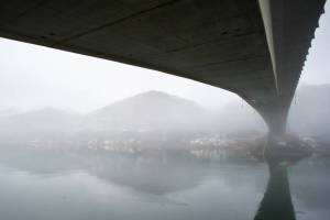 Morning fog shrouds Douglas Island near the Douglas Bridge on Wednesday, Jan. 8, 2014. (Michael Penn | Juneau Empire File)