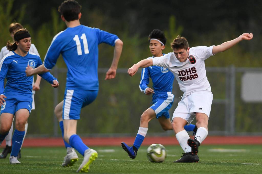 Juneau-Douglas Richard Lehner kicks a goal against Thunder Mountain at TMHS on Tuesday, May 14, 2019. JDHS won 5-1. (Michael Penn | Juneau Empire)