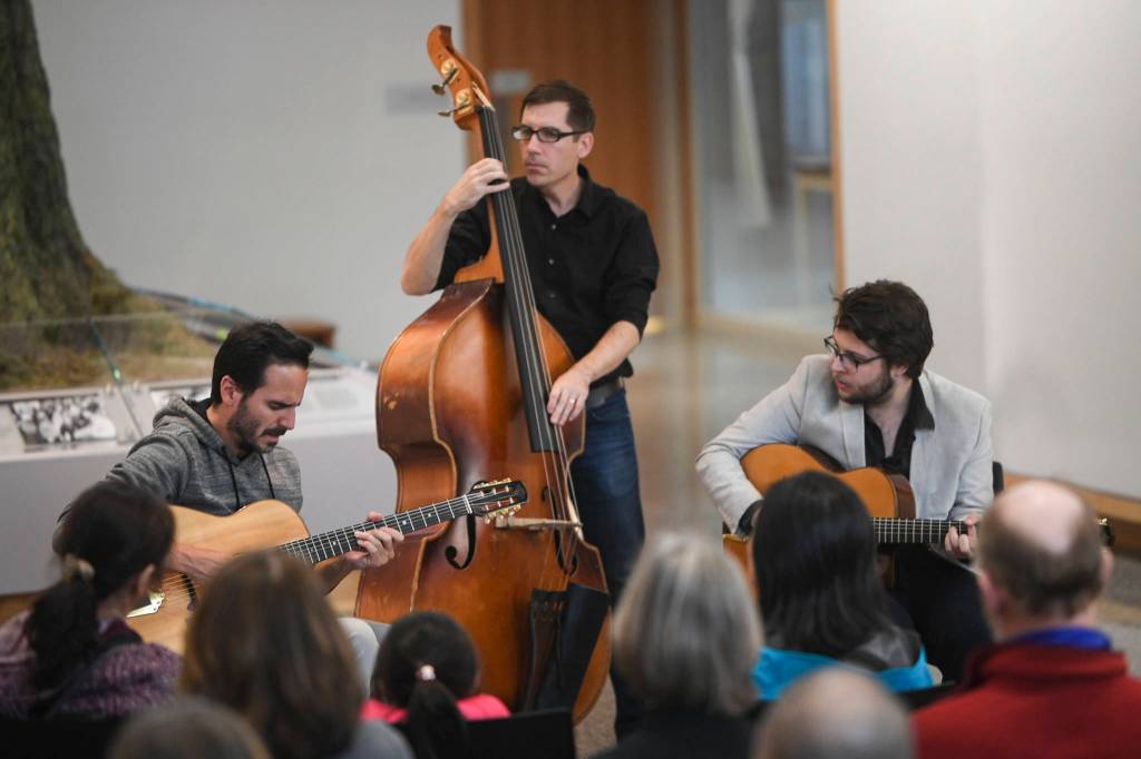 Members of the Gonzalo Bergara Trio perform in the atrium of the Andrew P. Kashevaroff (APK) Building as part of Juneau Jazz & Classics on Friday, May 10, 2019. The music festival continues through May 18. (Michael Penn | Juneau Empire)