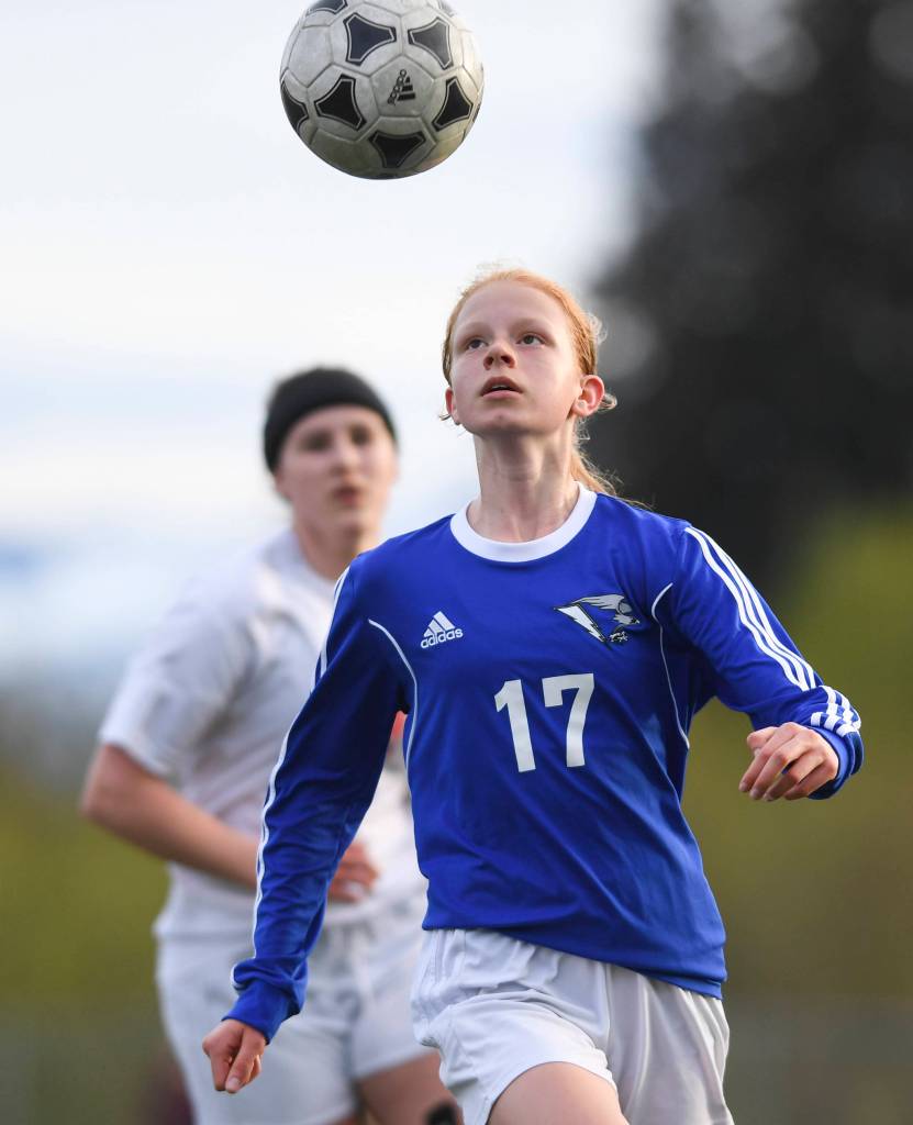 Thunder Mountains Julia Robinson looks to control the ball against Juneau-Douglas at TMHS on Tuesday, May 14, 2019. JDHS won 3-0. (Michael Penn | Juneau Empire)