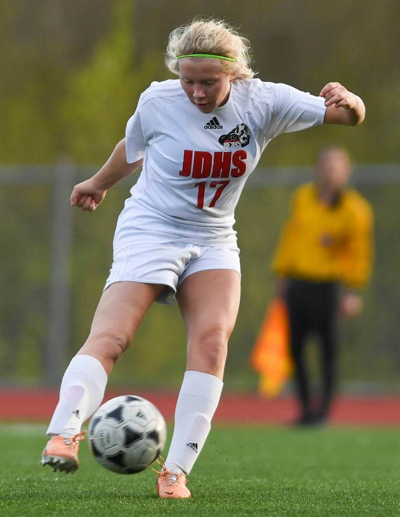 Juneau-Douglas Taylor Bentley kicks the first goal of the game against Thunder Mountain at TMHS on Tuesday, May 14, 2019. JDHS won 3-0. (Michael Penn | Juneau Empire)
