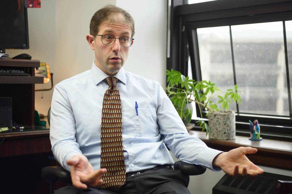 Sen. Jesse Kiehl, D-Juneau, speaks in his Capitol office on Wednesday, April 24, 2019, about the Department of Transportations proposal to build a ferry terminal at Cascade Point in Berners Bay. (Michael Penn | Juneau Empire)