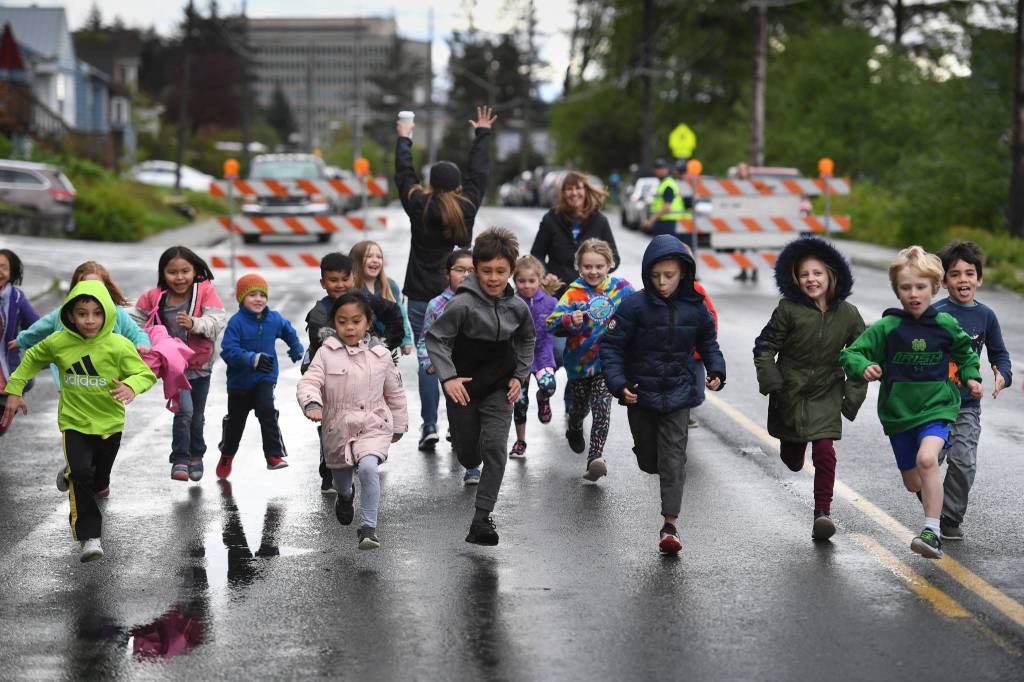 Harborview Elementary School holds its annual Fun Run along Glacier Avenue on Friday, May 17, 2019. Students from Montessori Borealis also ran the three-mile course. (Michael Penn | Juneau Empire)
