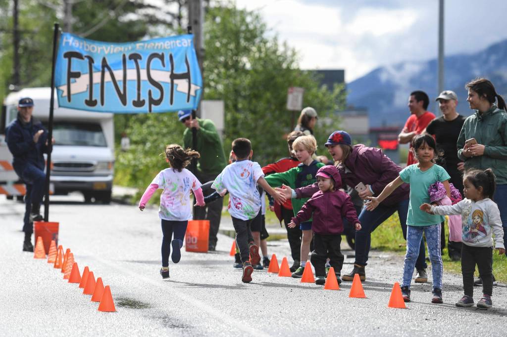 Harborview Elementary School holds its annual Fun Run along Glacier Avenue on Friday, May 17, 2019. Students from Montessori Borealis also ran the three-mile course. (Michael Penn | Juneau Empire)
