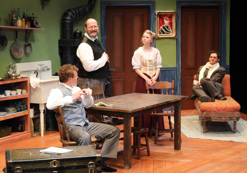 Unlikely housemates Frank Versati (Ben Brown), Theo (Aaron T. Moore), Louise (Kelly Gibson) and Benjamin Cohen (Evan Rothfeld) talk during Perseverance Theatres The Underpants. (Courtesy Photo | Perseverance Theatre)