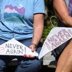Women attend a rally against anti-abortion laws, wait for the rally to start at the Dimond Courthouse Plaza on Tuesday, May 21, 2019. (Michael Penn | Juneau Empire)