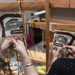Anastasia Hobson-George, left, works with weaver Lily Hope on Chilkat legging weavings as the Artist-in-Residence at the Walter Soboleff Center on Wednesday, May 22, 2019. (Michael Penn | Juneau Empire)