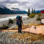 In this October 2018 photo, Bjorn Dihle inspects the acid mine drainage flowing into the Tulsequah River from a containment pond filled by effluent from the Tulsequah Chief Mine in British Columbia, Canada. (Courtesy Photo | Chris Miller)