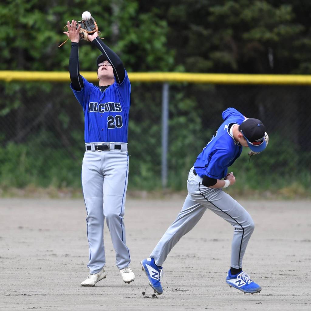 Thunder Mountains Oliver Mendoza catches a fly all against Sitka as teammate Bryson Echiverri ducks out of the way during the Region V Baseball Championship at Adair-Kennedy Memorial Park on Friday, May 24, 2019. (Michael Penn | Juneau Empire)