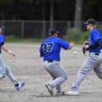 A pop-up drops between Thunder Mountain infielders during the Region V Baseball Championship at Adair-Kennedy Memorial Park on Friday, May 24, 2019. (Michael Penn | Juneau Empire)